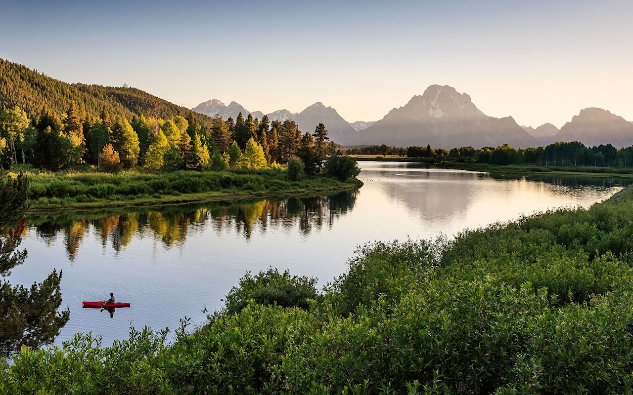 Fall/Winter Family Itinerary: 6 Days Logan to Jackson to Yellowstone | Photo Gallery | 1 - Grand Teton National Park Fish, kayak, or fish while you kayak on the Snake River in Grand Teton National Park.