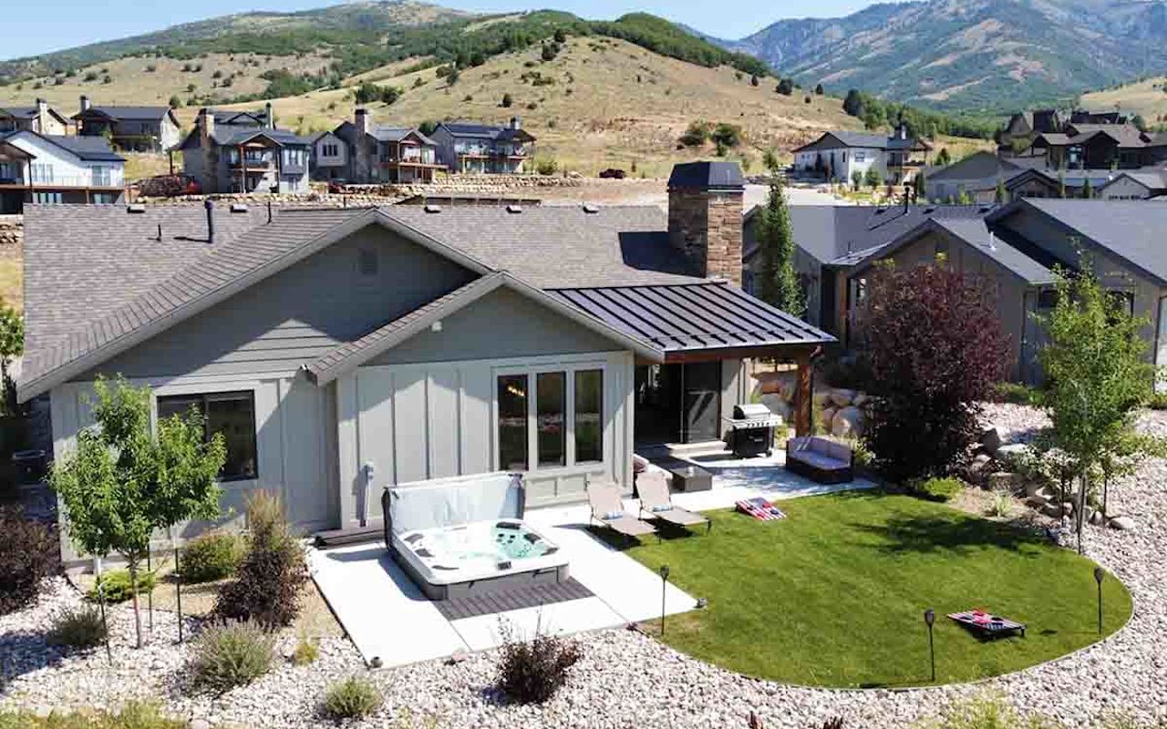 Powder Mountain Escapes
A cozy vacation rental boasting three bedrooms, two baths, and space for eight guests. Relax in the private hot tub with stunning mountain vistas, or gather around the fireplace for cozy evenings. Enjoy outdoor activities like pickleball and disc golf in the community. Your unforgettable mountain retreat awaits.