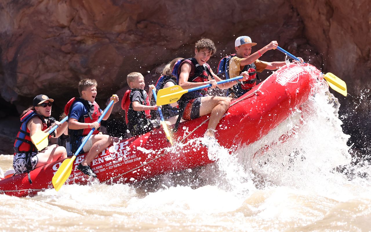 Moab Adventure Center | Photo Gallery | 6 - River Rafting Tours Experience the "Best Guided Moab Rafting Trips" in Moab, Utah. This is a "must-do adventure" while in Moab. On our full-day and half-day river rafting adventures, you'll experience a world-renowned stretch of the Colorado River, winding through scenes made famous by dozens of popular movies.