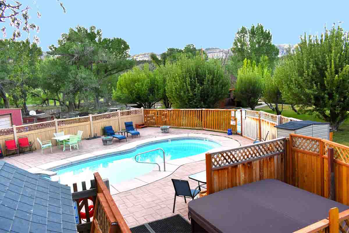 East Zion's Arrowhead Country Inn and Cabins | Photo Gallery | 2 - Relax in the hot tub and pool. 