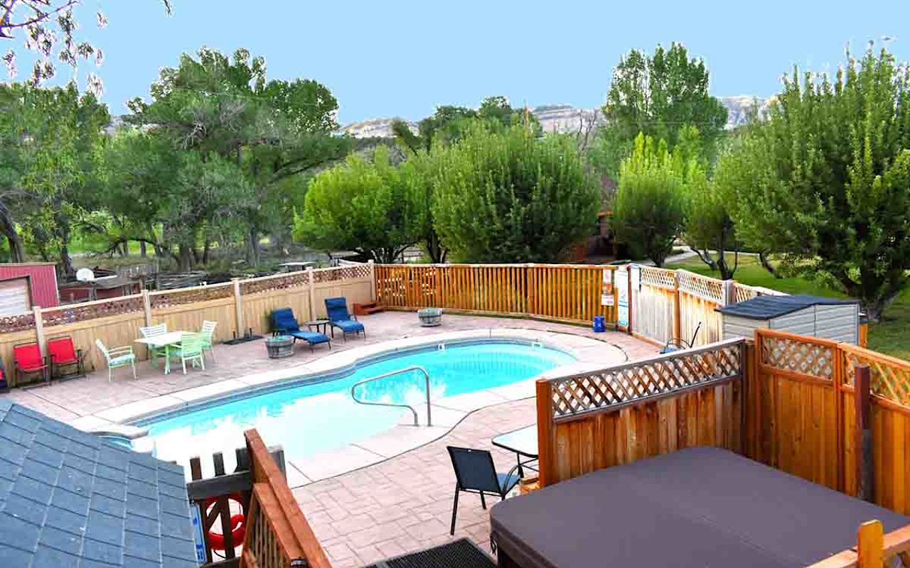 East Zion's Arrowhead Country Inn and Cabins | Photo Gallery | 2 - Relax in the hot tub and pool.