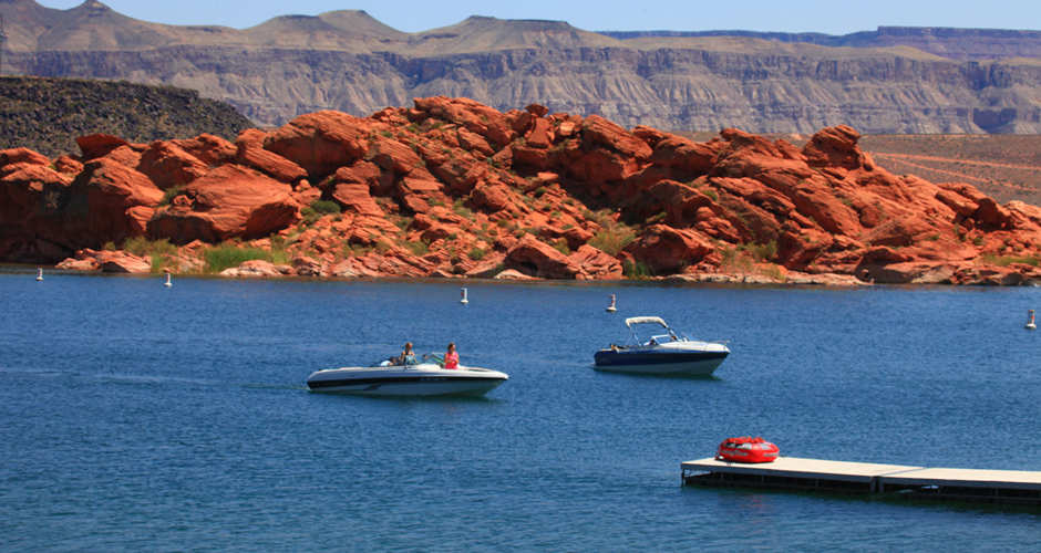Sand Hollow State Park Boating | Photo Gallery | 0 -  Red rock and red sand meet warm, blue water at this state park, which is one of the most popular in Utah. his is a great place to camp, picnic, boat, fish and ride ATVs.