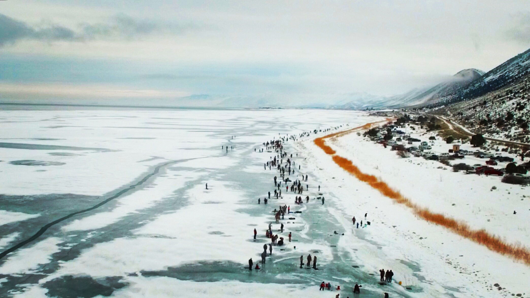 FALL IN BEAR LAKE IN WINTER | Photo Gallery | 0 - Cisco Disco Ice Fishing Holes at Bear Lake