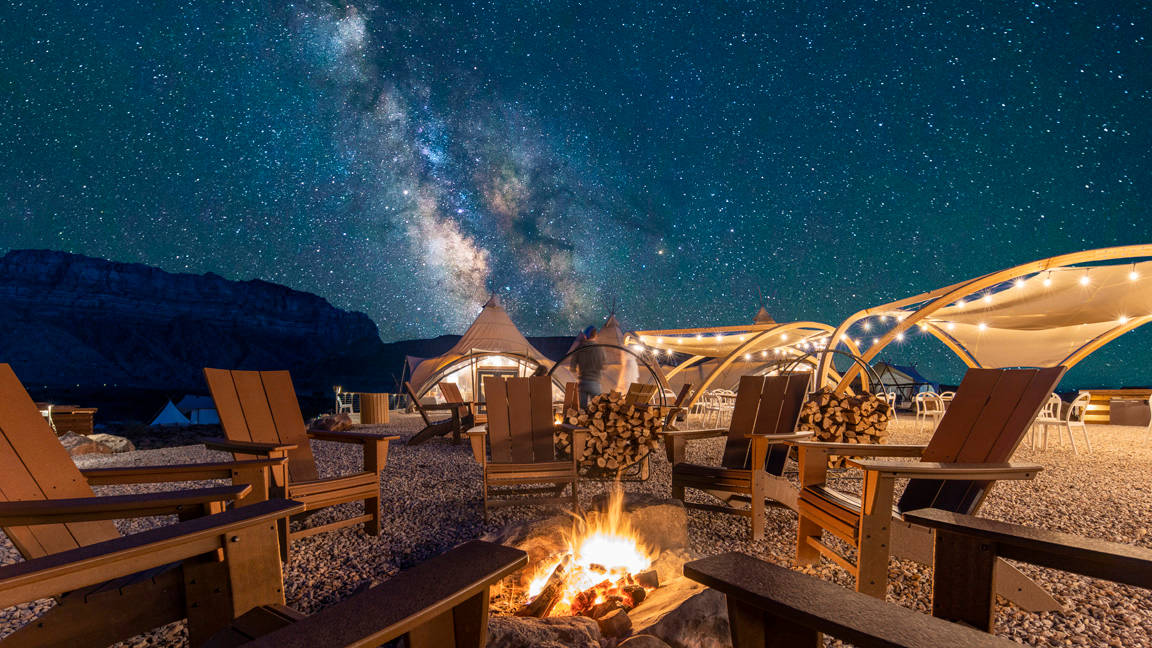 Under Canvas Zion National Park - The Milky Way is visible above a safari-inspired tent at Under Canvas Zion