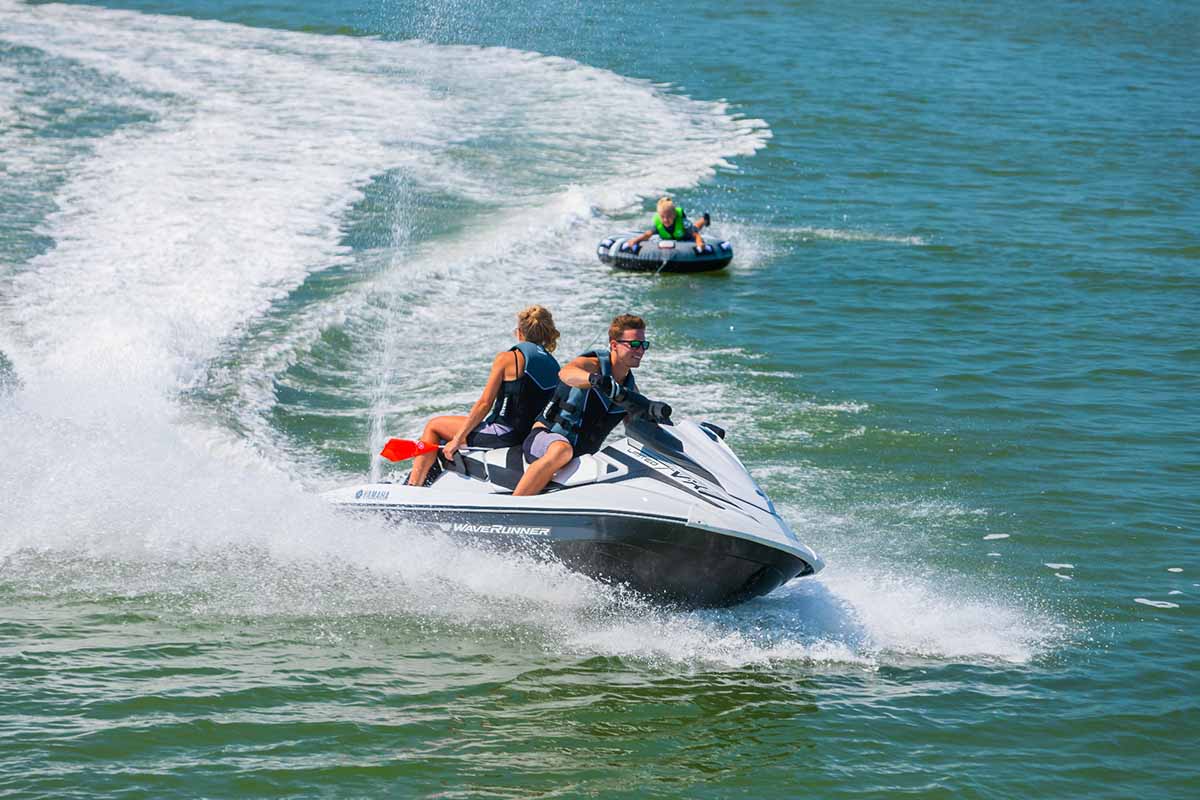 Jet ski rental with tube in tow