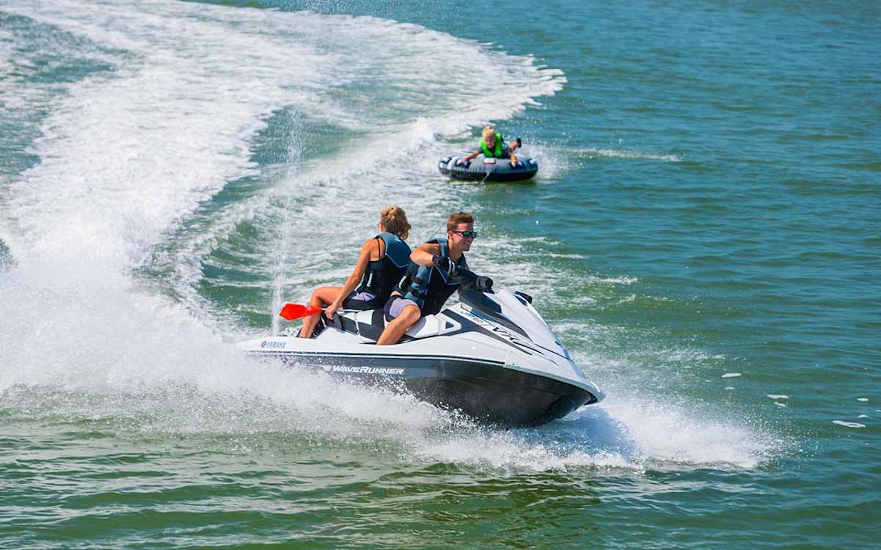 Jet ski rental with tube in tow