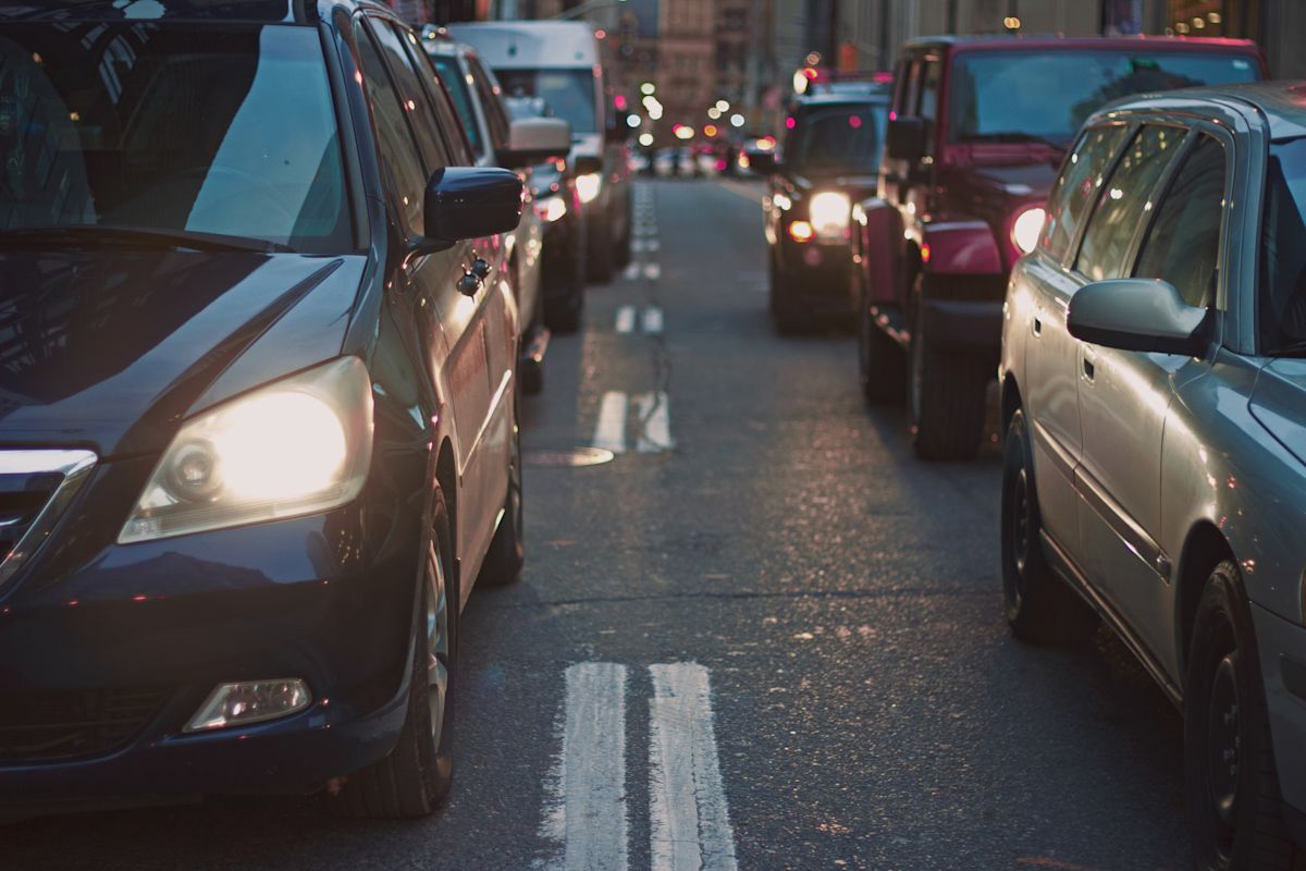 cars lined up at a stop light