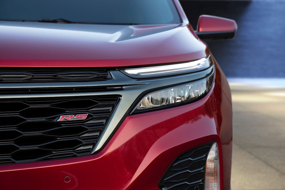 a close up of a red 2022 Chevrolet Equinox