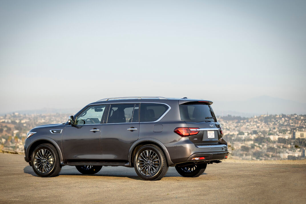 a 2022 infiniti qx80 parked on gravel pavement