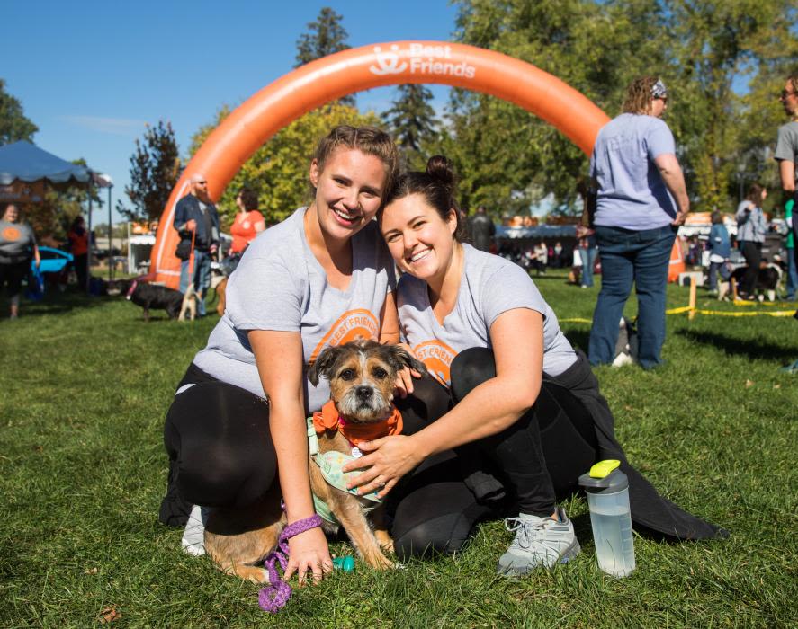 Two women attend Best Friends' Strut Your Mutt in Salt Lake City. 