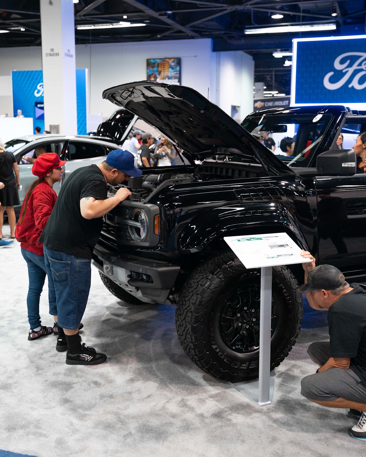 Ford truck men looking in