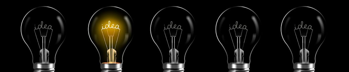 lightbulbs representing ideas set against a black background 