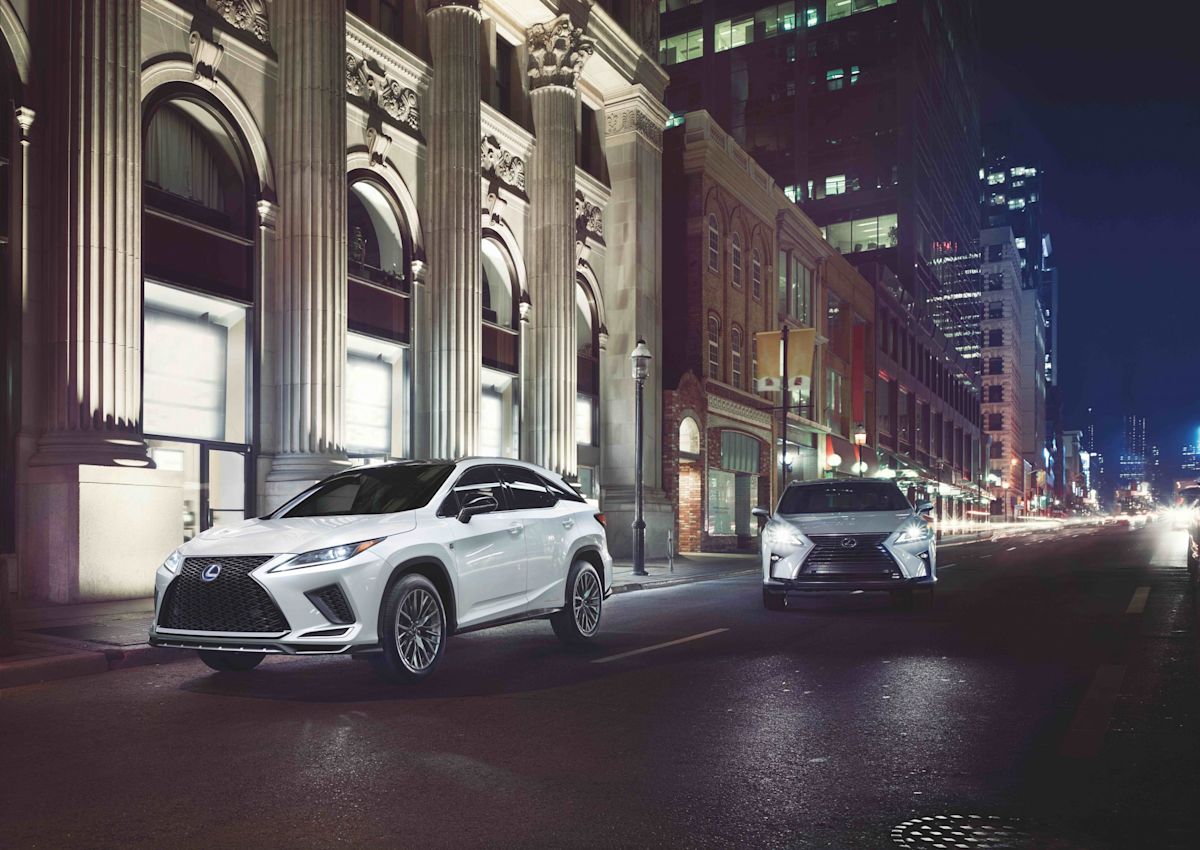 two 2022 Lexus RX 450hs driving 