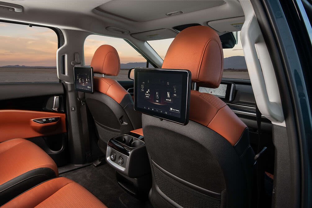 the leather back seat of a 2022 Kia Carnival.