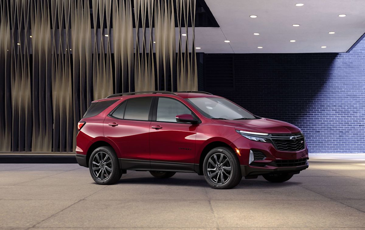 a profile of a red 2022 Chevrolet Equinox