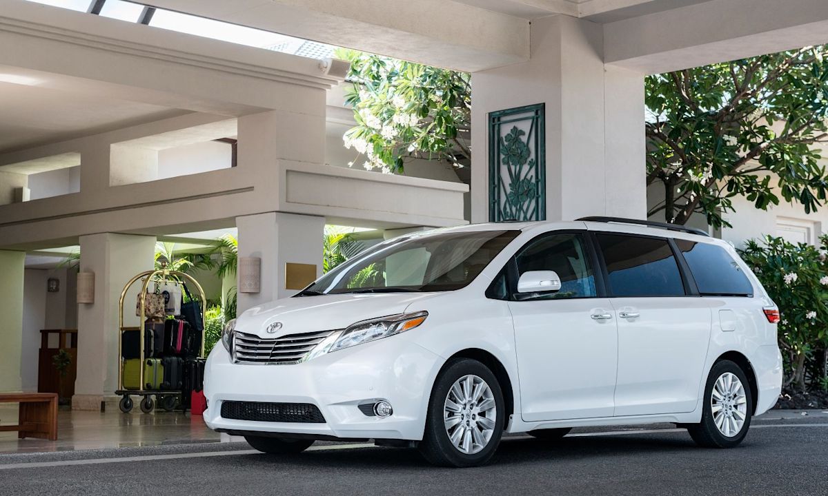 a white toyota sienna minivan 